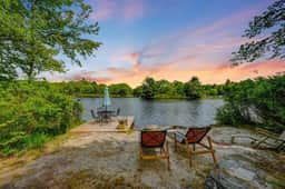 LAKESIDE ON LAKE NAOMI - boats, hot tub, beach, dock. Dogs OK